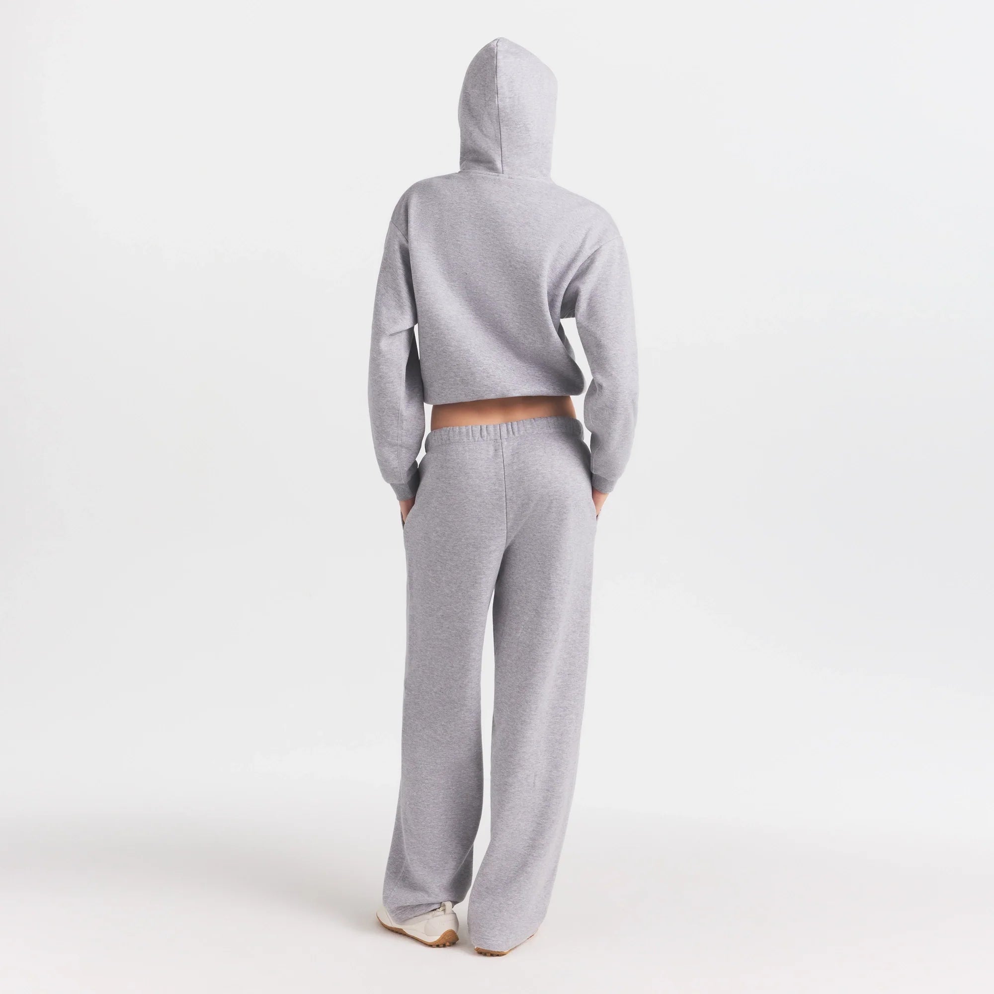 COTTON FLEECE CLASSIC HOODIE | HEATHER GREY ON A MODEL FRONT VIEW @ | FOCUS: 0.0, 1.0, 0.9