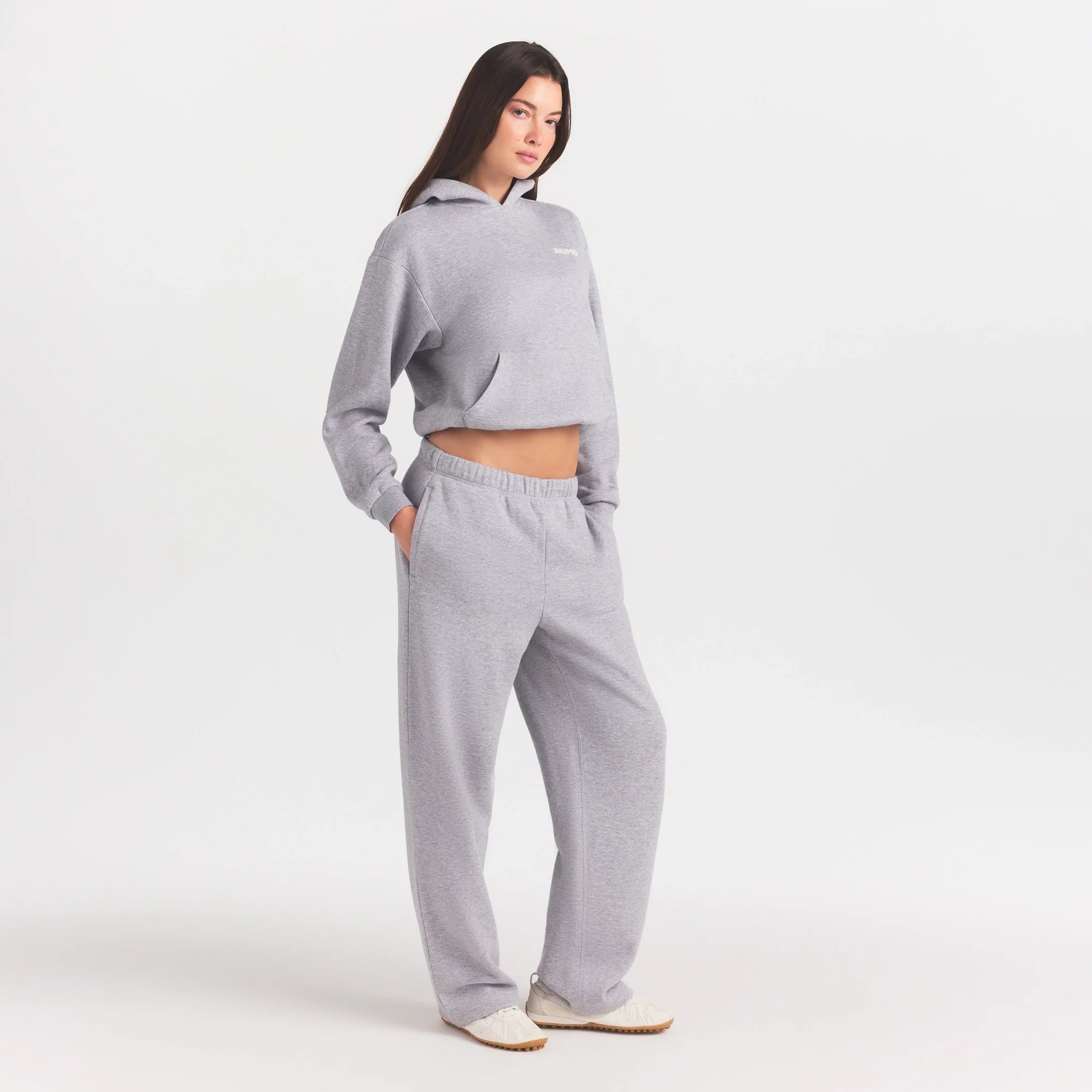 COTTON FLEECE CLASSIC HOODIE | HEATHER GREY ON A MODEL FRONT VIEW @ | FOCUS: 0.0, 1.0, 0.9