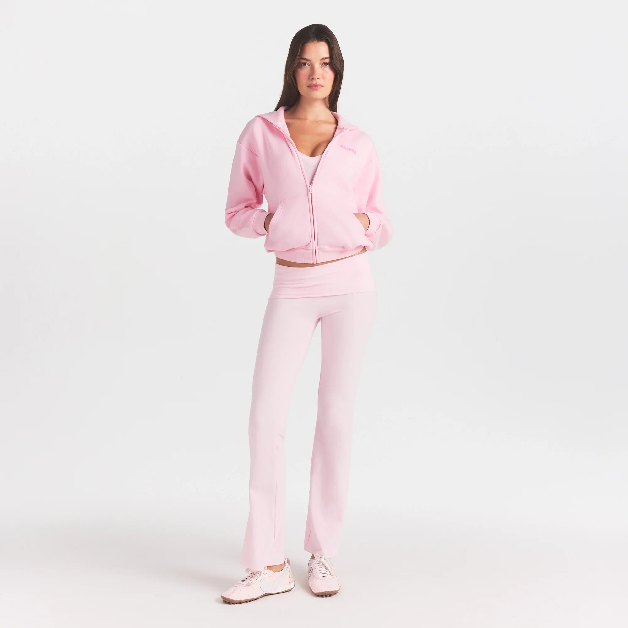 COTTON FLEECE CLASSIC ZIP UP HOODIE | CHERRY BLOSSOM ON A MODEL FRONT VIEW @ | FOCUS: 0.0, 1.0, 0.9