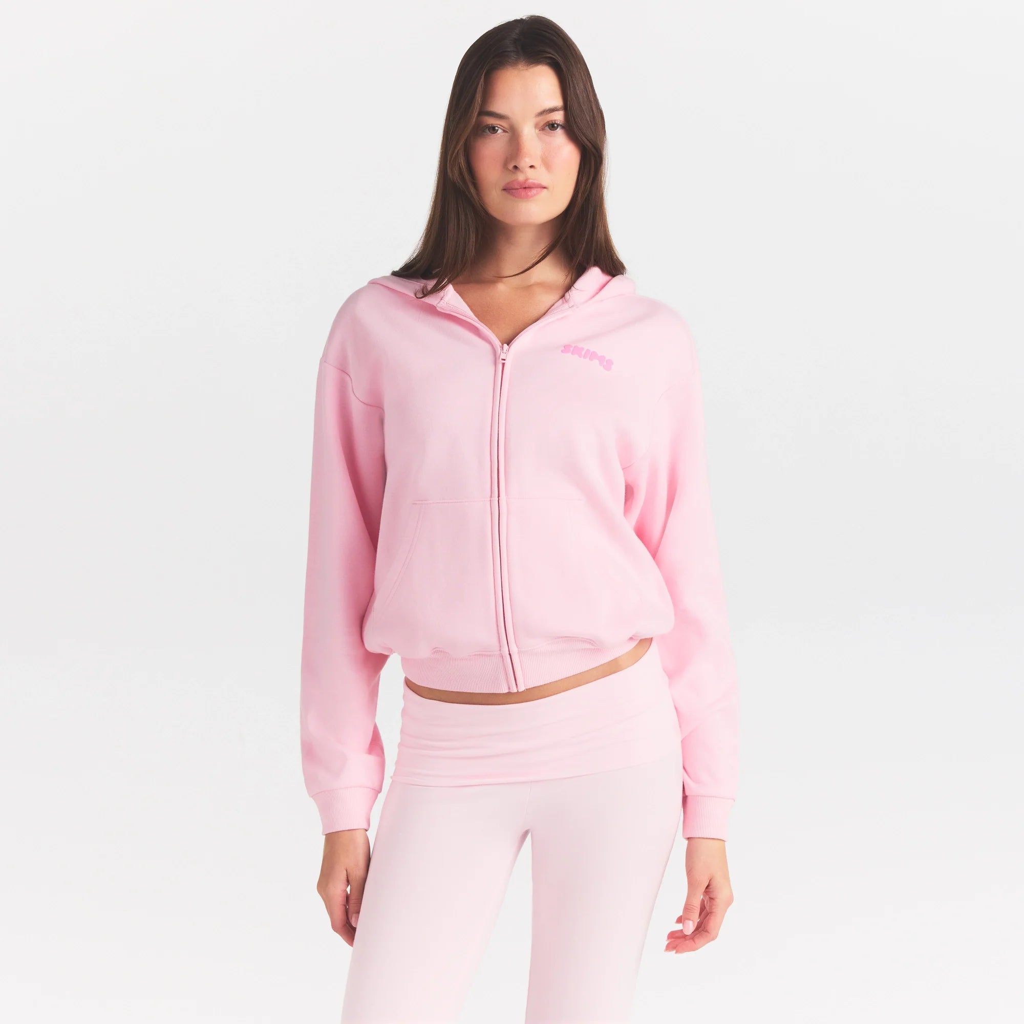 COTTON FLEECE CLASSIC ZIP UP HOODIE | CHERRY BLOSSOM ON A MODEL SIDE VIEW @ | FOCUS: 0.0, 1.0, 0.9