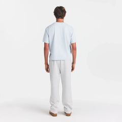 HEAVYWEIGHT COTTON MENS RELAXED CROPPED CREWNECK | ATMOSPHERE ON A MODEL BACK VIEW @ | FOCUS: 0.0, 1.0, 0.9