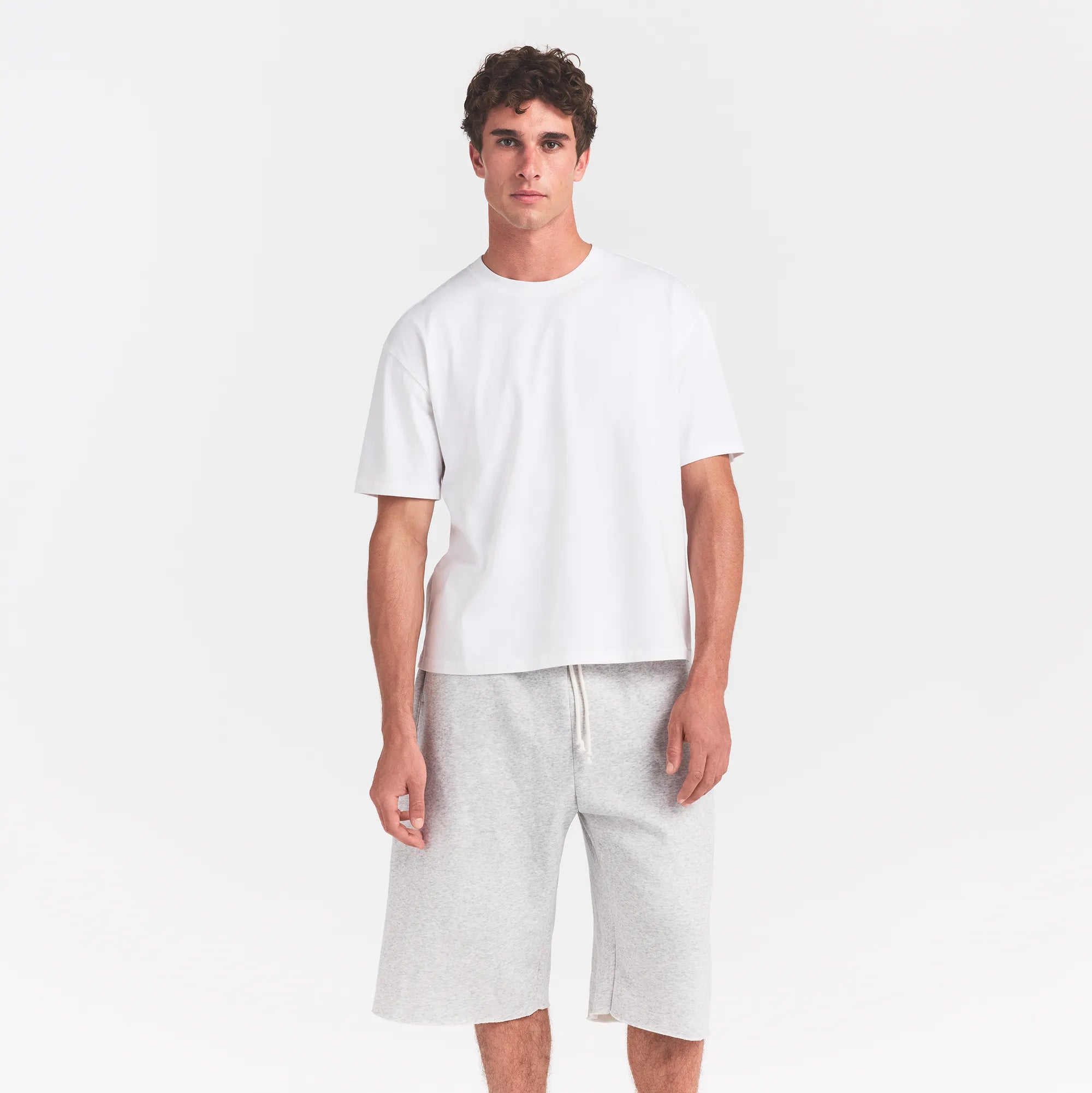 HEAVYWEIGHT COTTON MENS RELAXED CROPPED CREW NECK T-SHIRT | CHALK ON A MODEL FRONT VIEW @ | FOCUS: 0.0, 1.0, 0.9
