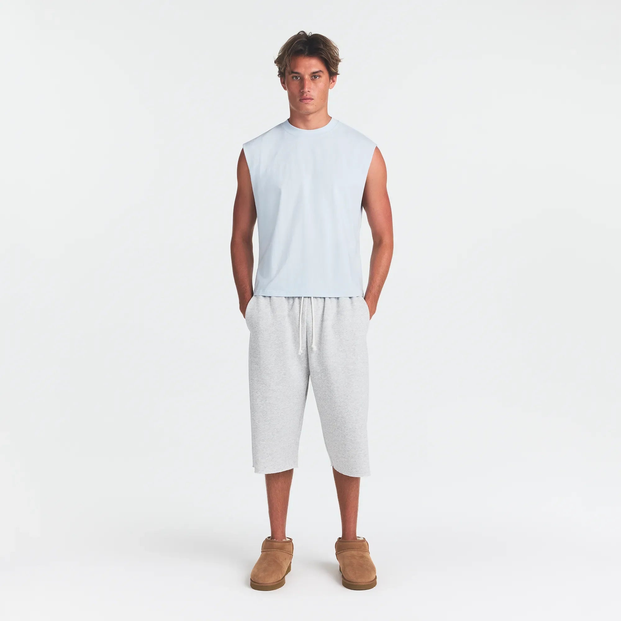 HEAVYWEIGHT COTTON MENS CROPPED TANK | ATMOSPHERE ON A MODEL FRONT VIEW @ | FOCUS: 0.0, 1.0, 0.9