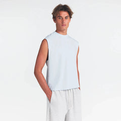 HEAVYWEIGHT COTTON MENS CROPPED TANK | ATMOSPHERE ON A MODEL SIDE VIEW @ | FOCUS: 0.0, 1.0, 0.9