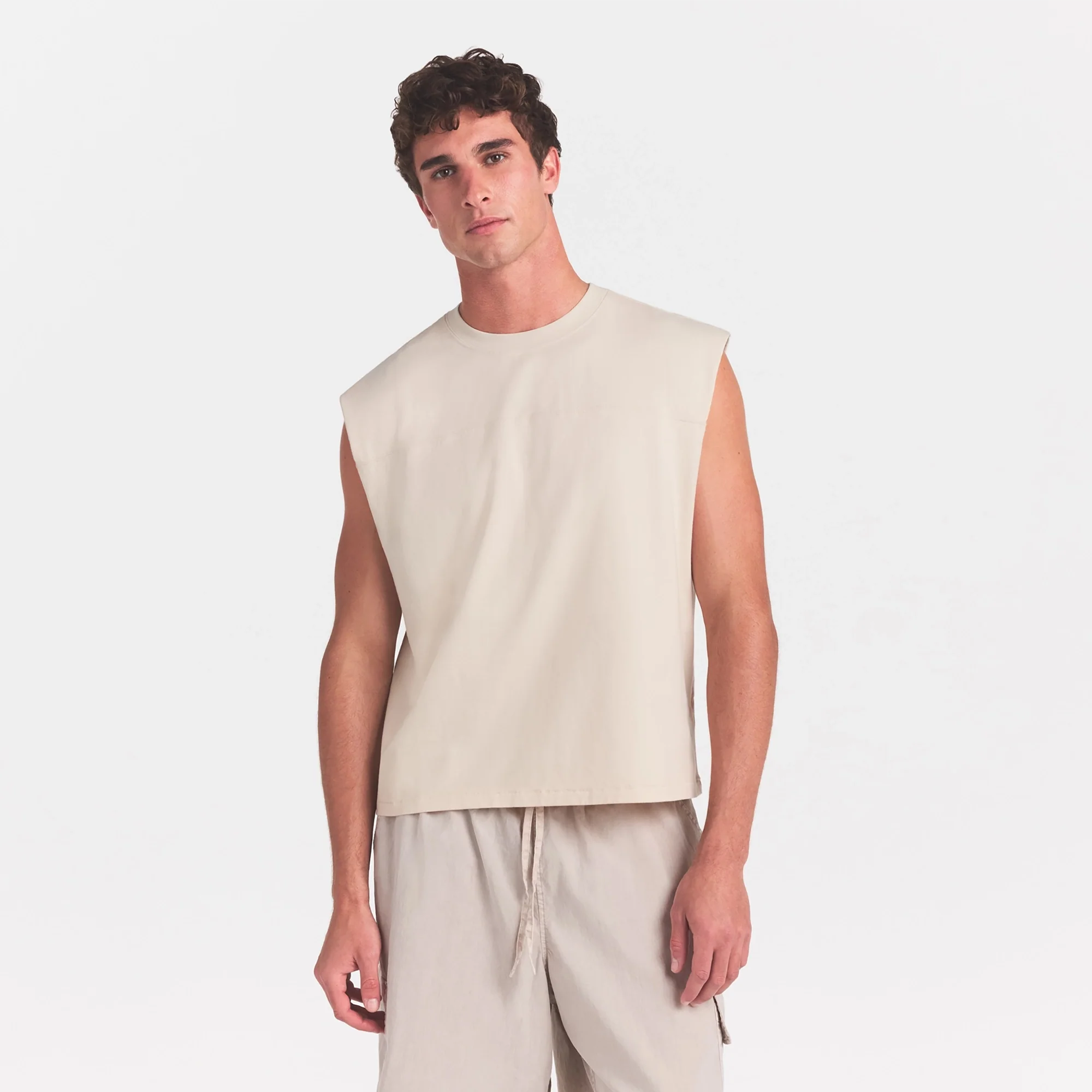 HEAVYWEIGHT COTTON MENS CROPPED MUSCLE TANK | BUFF ON A MODEL SIDE VIEW @ | FOCUS: 0.0, 1.0, 0.9