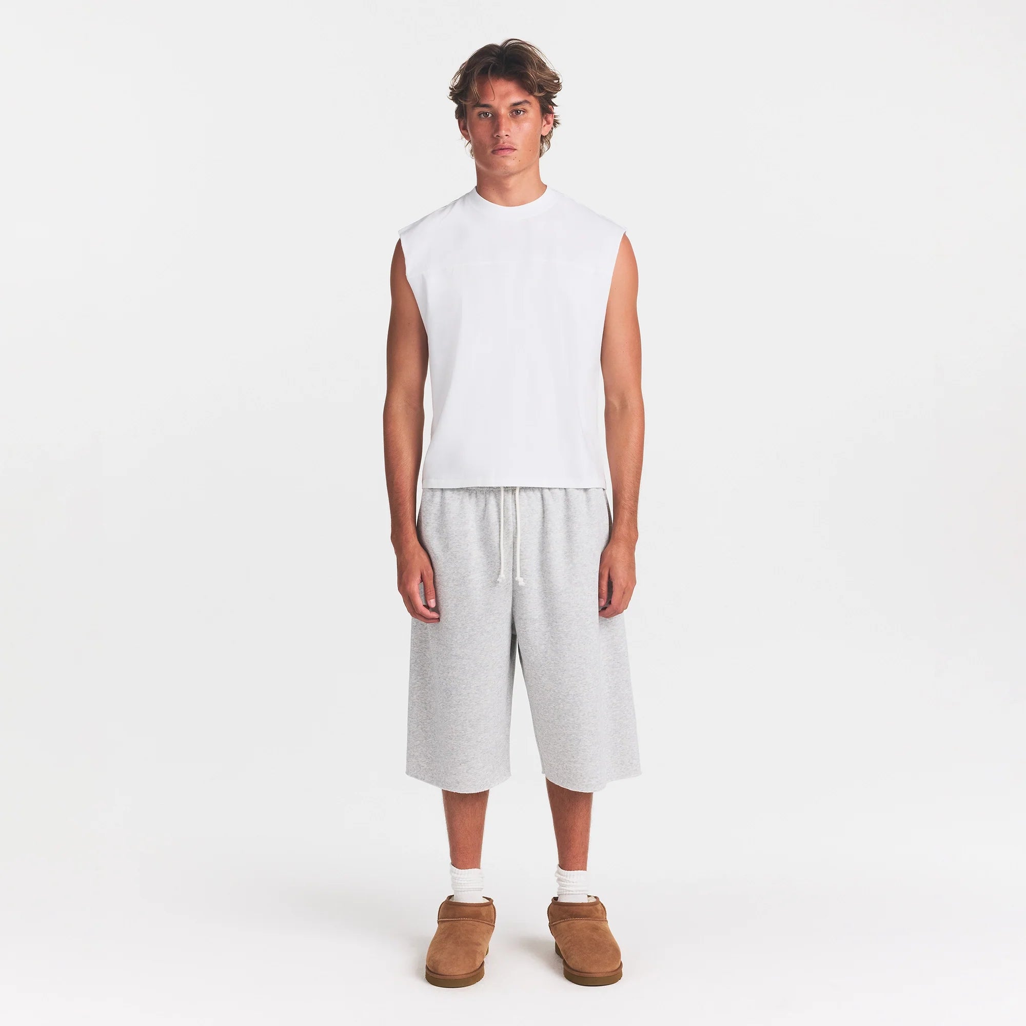 HEAVYWEIGHT COTTON MENS CROPPED MUSCLE TANK | CHALK ON A MODEL FRONT VIEW @ | FOCUS: 0.0, 1.0, 0.9