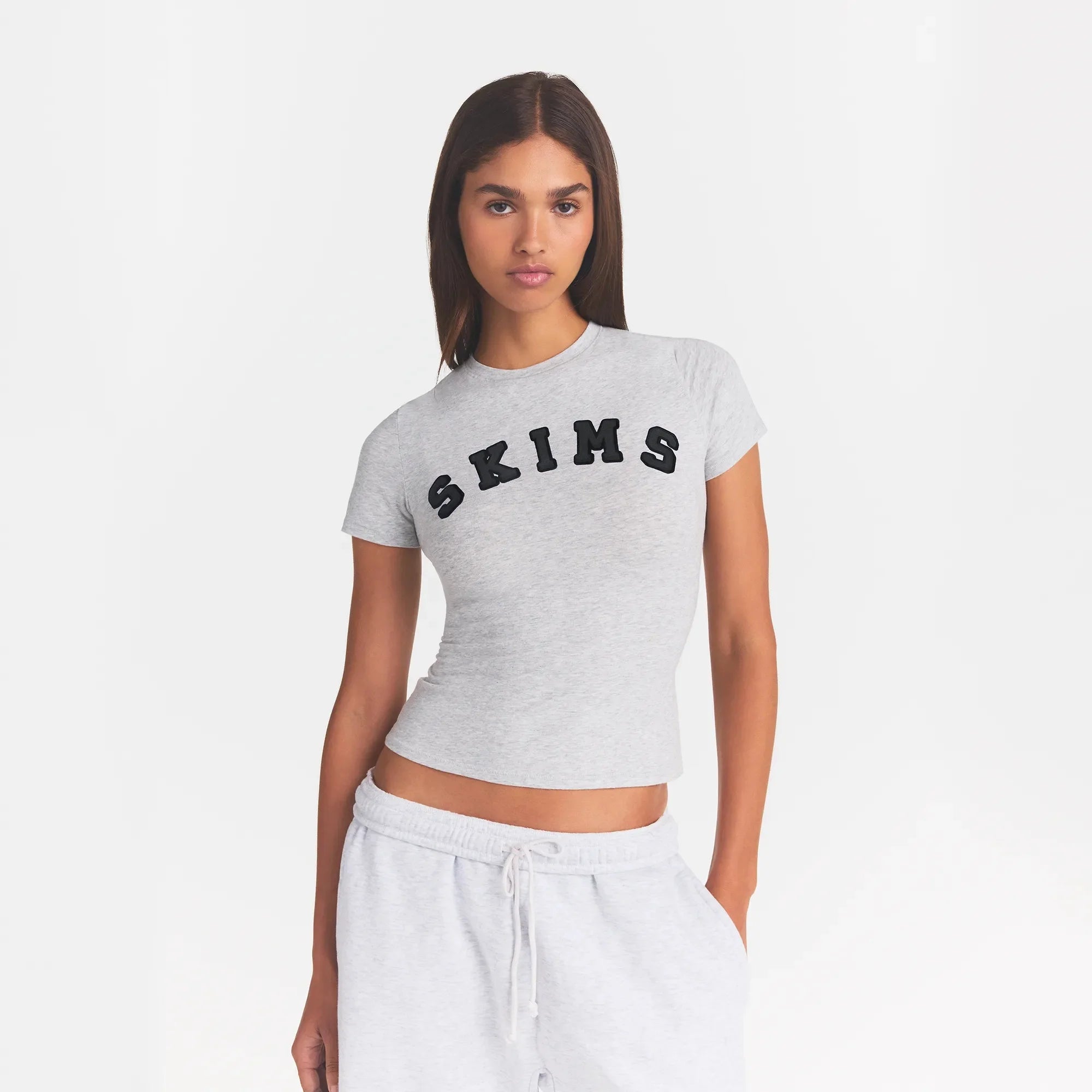 COTTON JERSEY T-SHIRT | LIGHT HEATHER GREY WITH ONYX LOGO ON A MODEL FRONT VIEW @ | FOCUS: 0.0, 1.0, 0.9