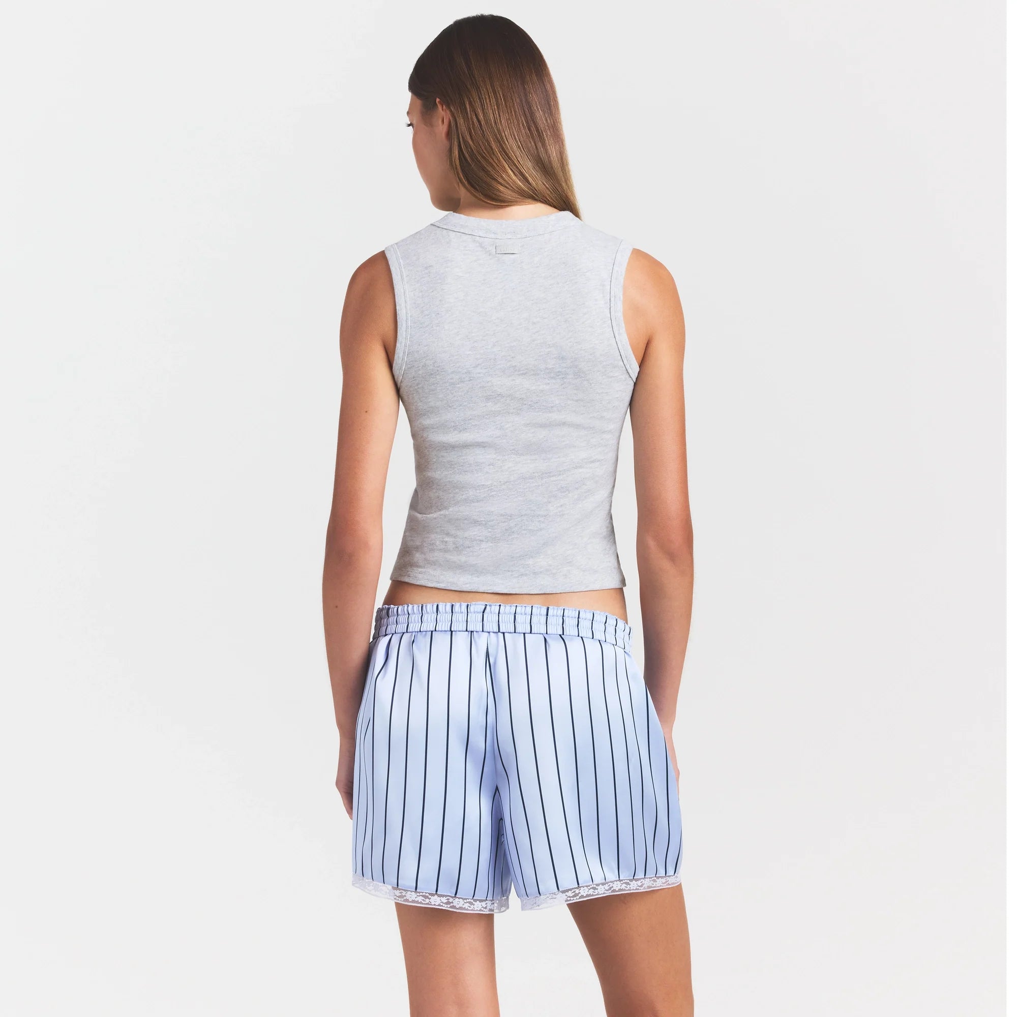 WORN IN JERSEY HIGH CREW TANK | LIGHT HEATHER GREY ON A MODEL SIDE VIEW @ | FOCUS: 0.0, 1.0, 0.9