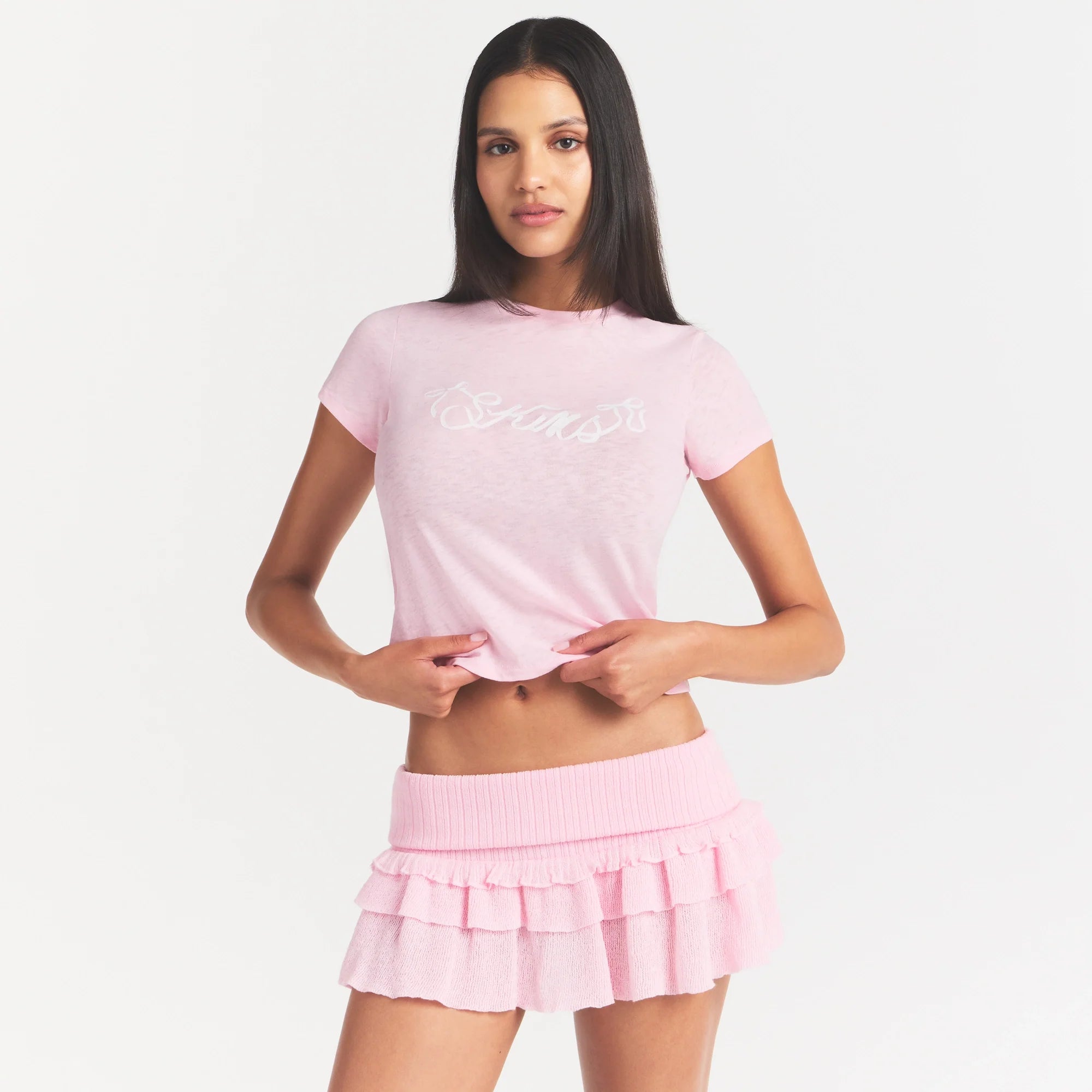 WORN IN JERSEY T-SHIRT | PEONY SKIMS BOW ON A MODEL SIDE VIEW @ | FOCUS: 0.0, 1.0, 0.9