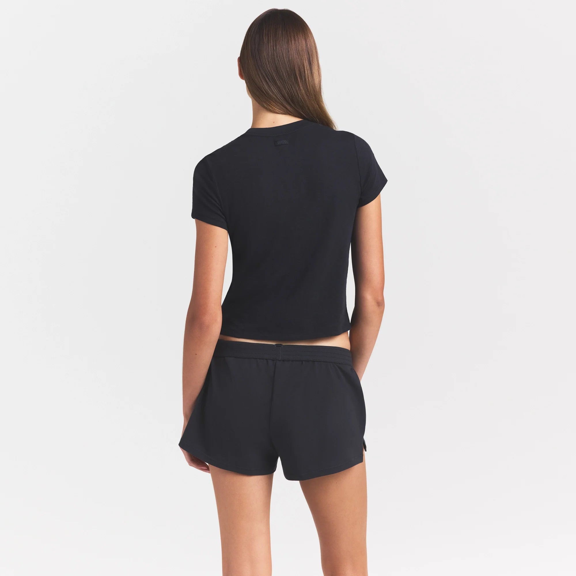 WORN IN JERSEY T-SHIRT | WASHED ONYX ON A MODEL SIDE VIEW @ | FOCUS: 0.0, 1.0, 0.9