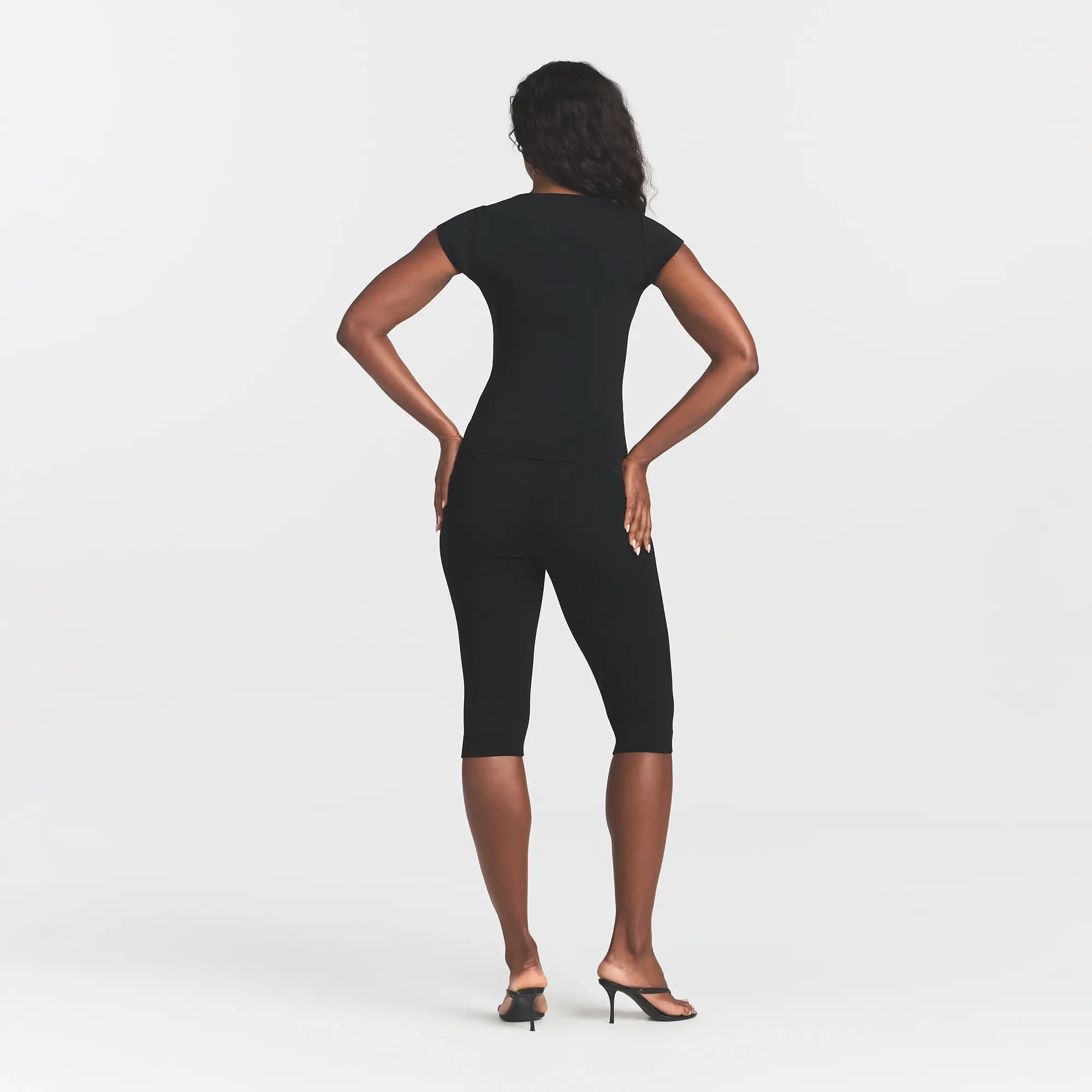 REFINED KNIT SCOOP NECK TOP | OBSIDIAN ON A MODEL FRONT VIEW @ | FOCUS: 0.0, 1.0, 0.9