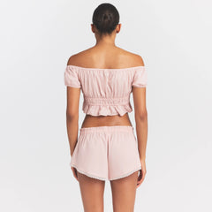 COTTON POPLIN OFF THE SHOULDER TOP | DUSTY PINK ON A MODEL SIDE VIEW @ | FOCUS: 0.0, 1.0, 0.9