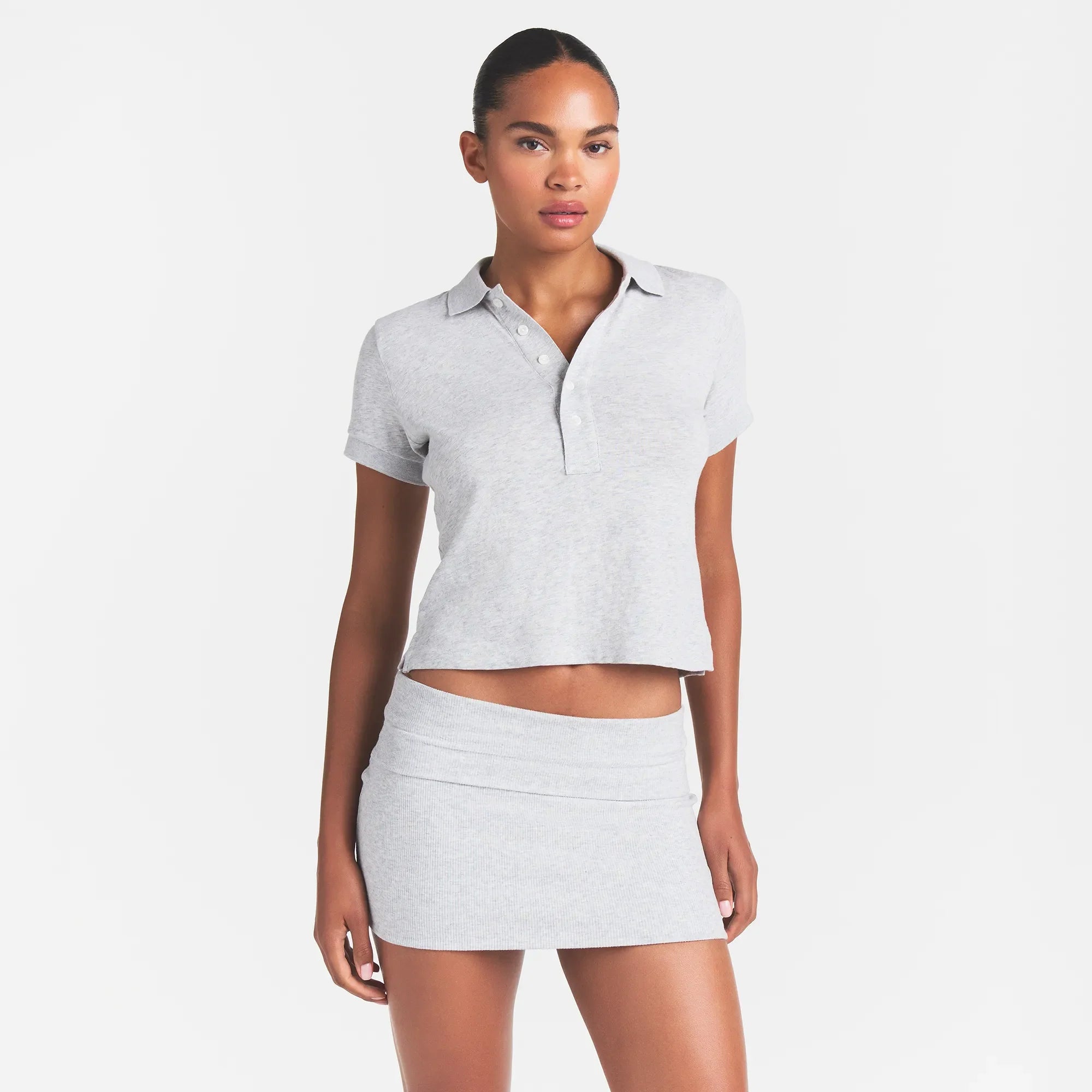 WORN IN JERSEY POLO | LIGHT HEATHER GREY ON A MODEL FRONT VIEW @ | FOCUS: 0.0, 1.0, 0.9