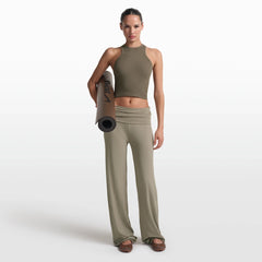 NikeSKIMS RIBBED SEAMLESS RACER FRONT TANK | DUSTY OAKMOSS/DUNE ON A MODEL FRONT VIEW @ | FOCUS: 0.0, 1.0, 0.9