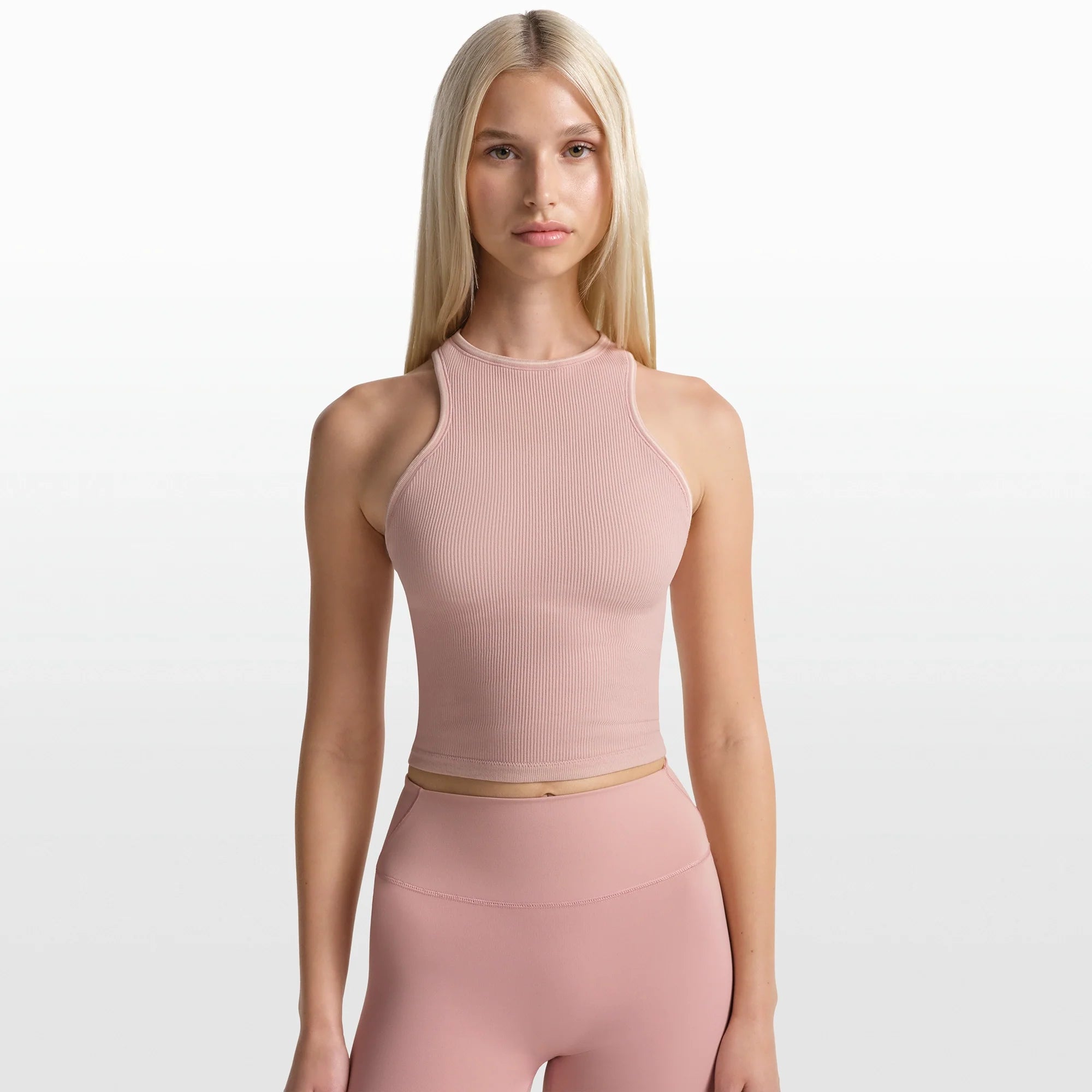 NikeSKIMS RIBBED SEAMLESS RACER FRONT TANK | HIMALAYAN ON A MODEL FRONT VIEW @ | FOCUS: 0.0, 1.0, 0.9