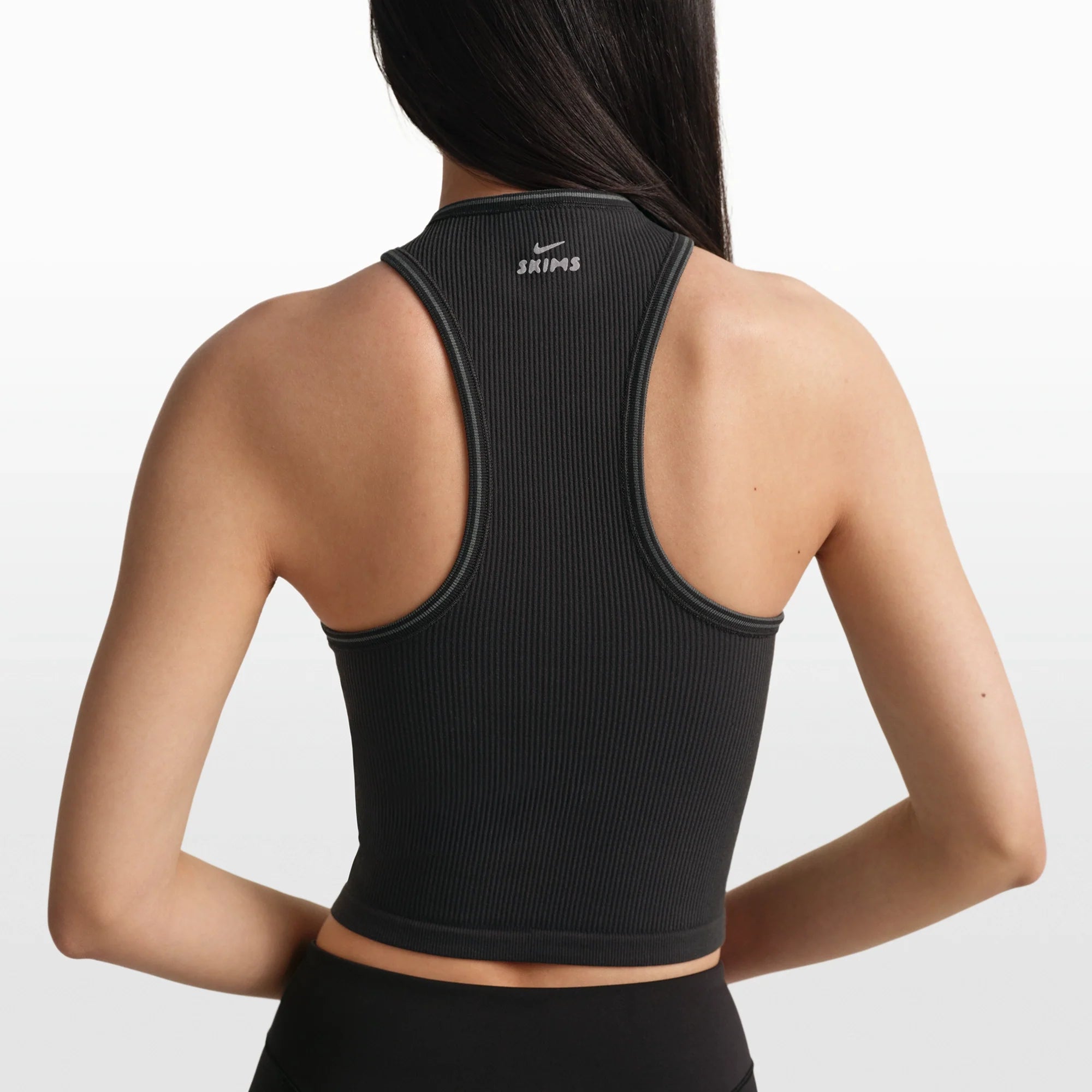 NikeSKIMS RIBBED SEAMLESS RACER FRONT TANK | OBSIDIAN/ARMOR ON A MODEL FRONT VIEW @ | FOCUS: 0.0, 1.0, 0.9