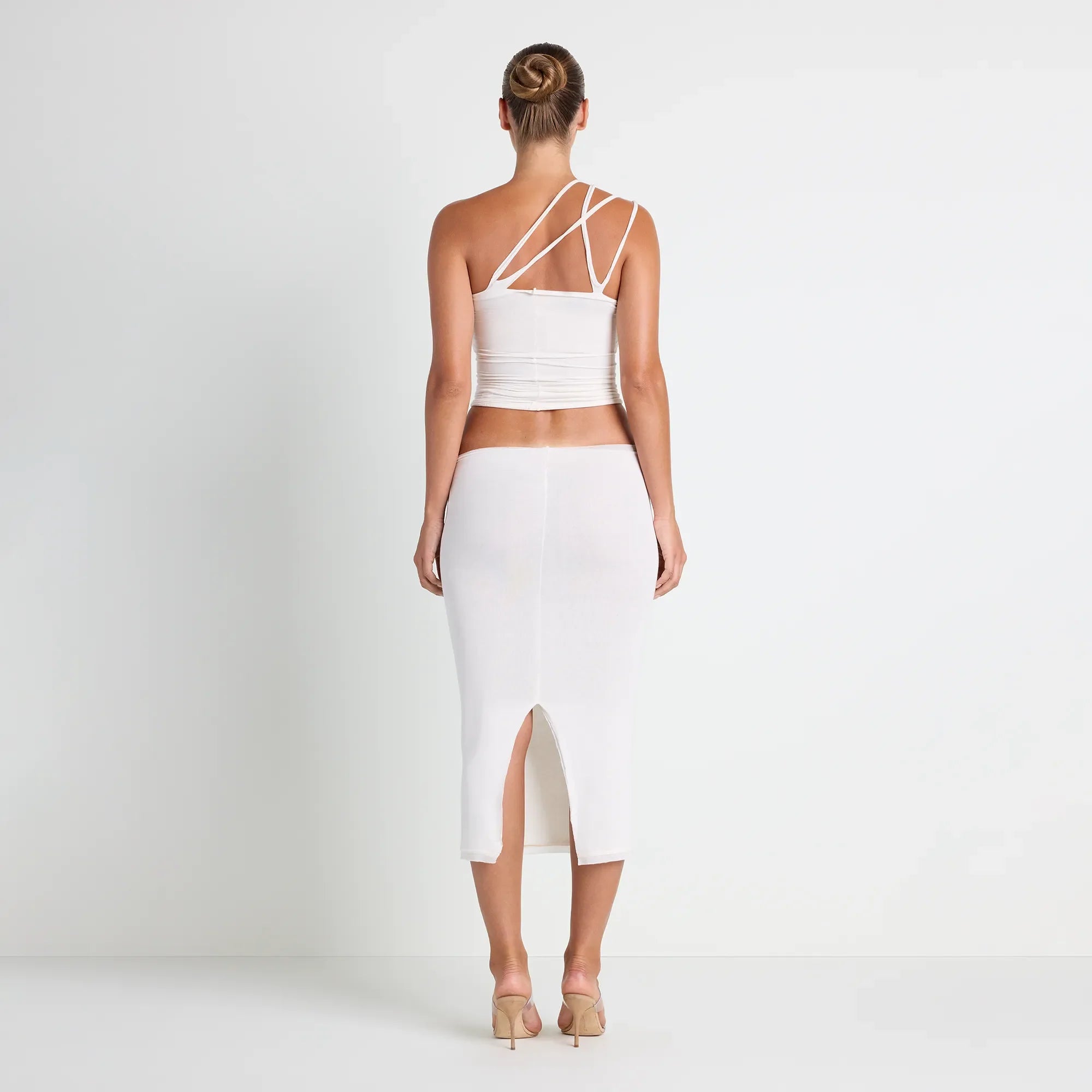 VETTESE X SKIMS SHEER MODAL TOP | ECRU ON A MODEL BACK VIEW | FOCUS: 0.0, 1.0, 0.9 @ | FOCUS: 0.0, 1.0, 0.9