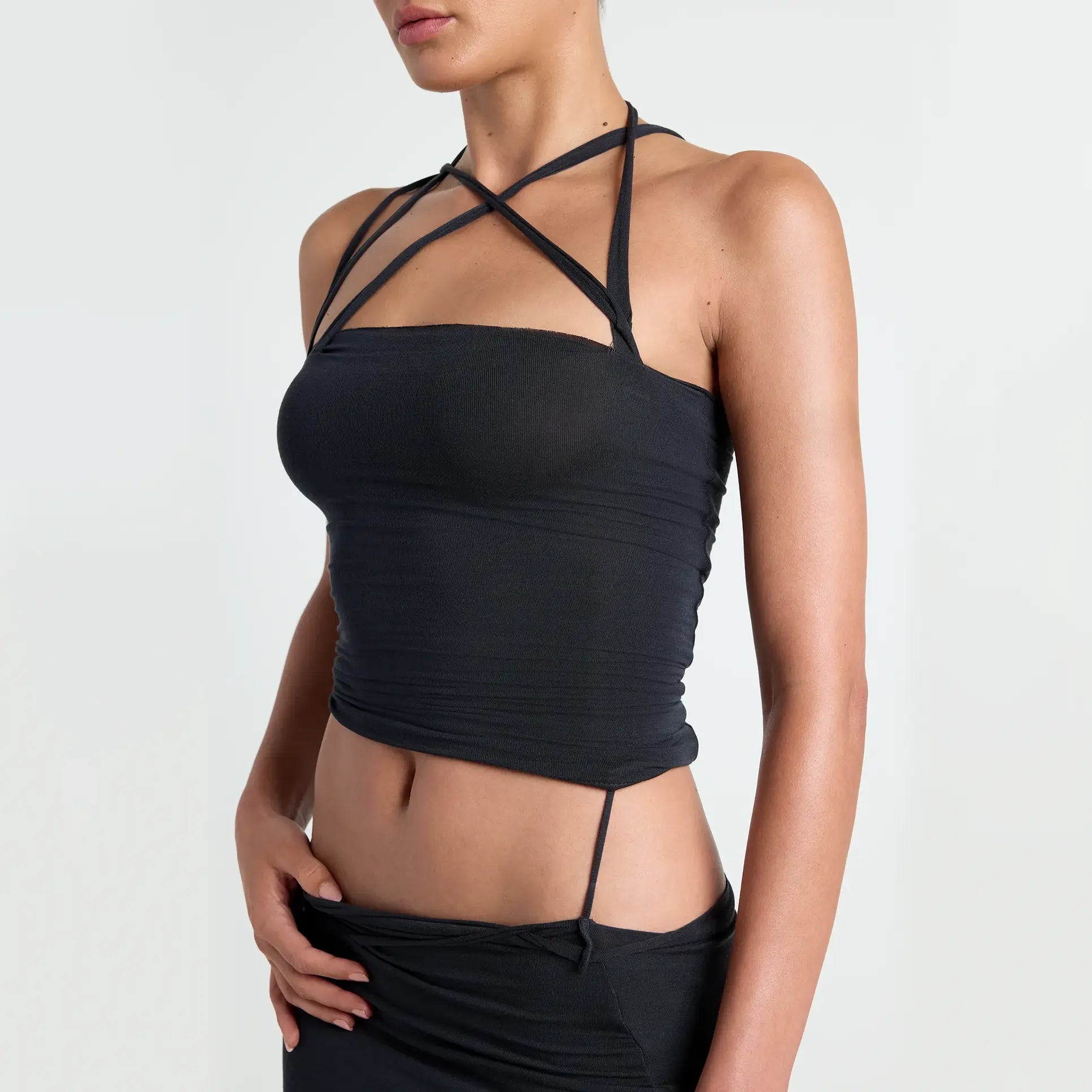 VETTESE X SKIMS SHEER MODAL TOP | ONYX ON A MODEL SIDE VIEW