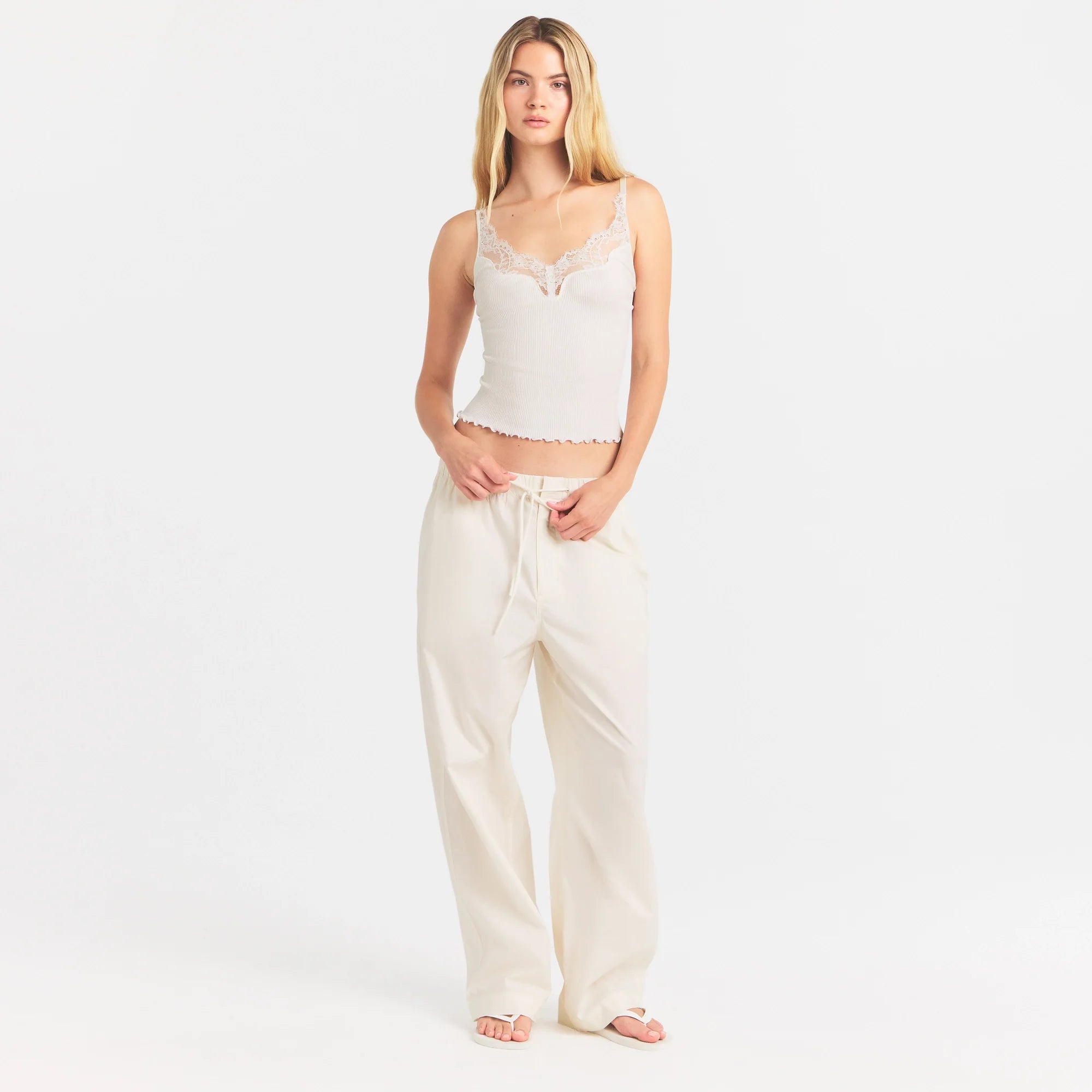 RIB KNIT LACE CAMI | EGRET ON A MODEL FRONT VIEW @ | FOCUS: 0.0, 1.0, 0.9