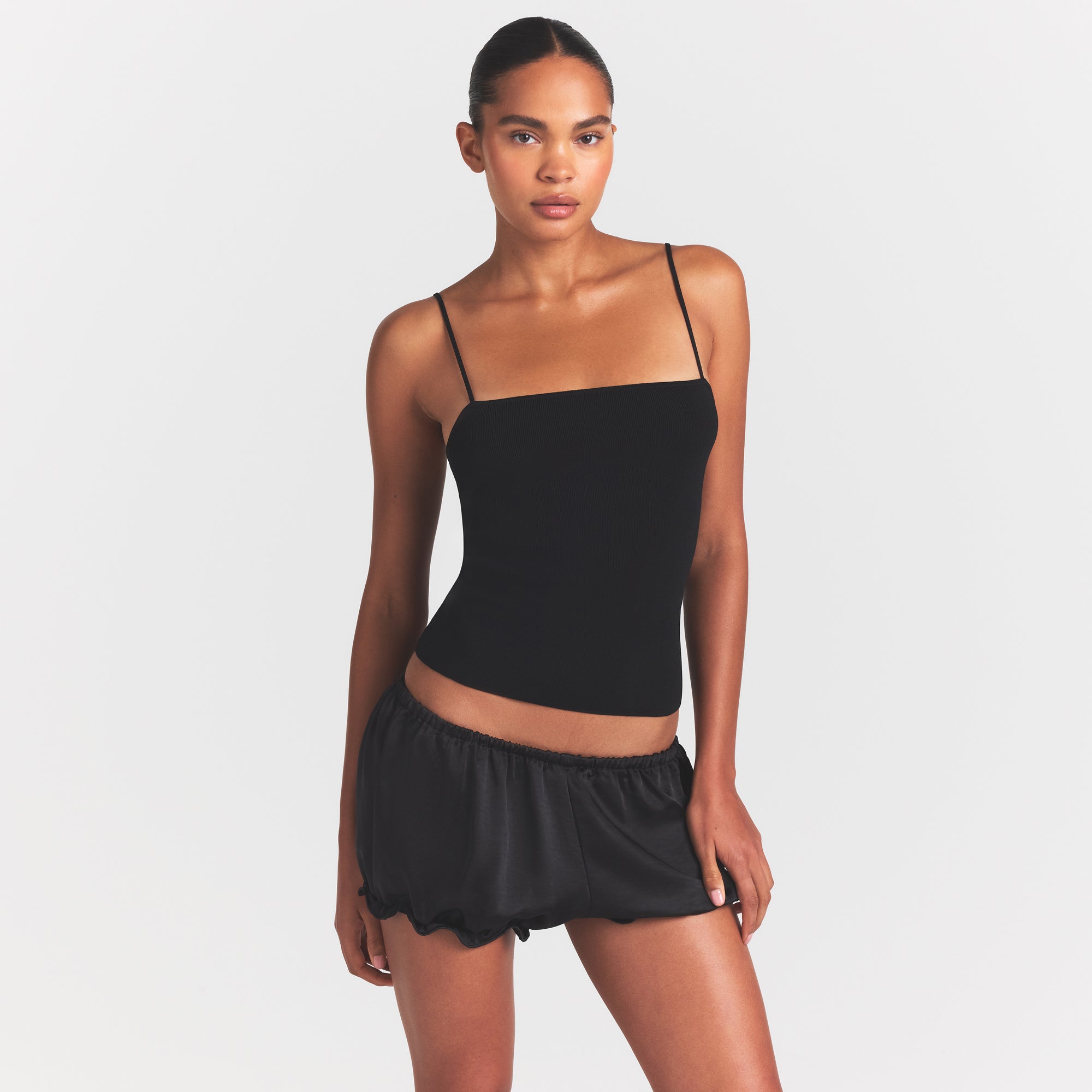 REFINED KNIT CAMI | OBSIDIAN ON A MODEL SIDE VIEW @ | FOCUS: 0.0, 1.0, 0.9