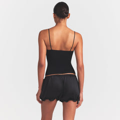 REFINED KNIT CAMI | OBSIDIAN ON A MODEL SIDE VIEW @ | FOCUS: 0.0, 1.0, 0.9