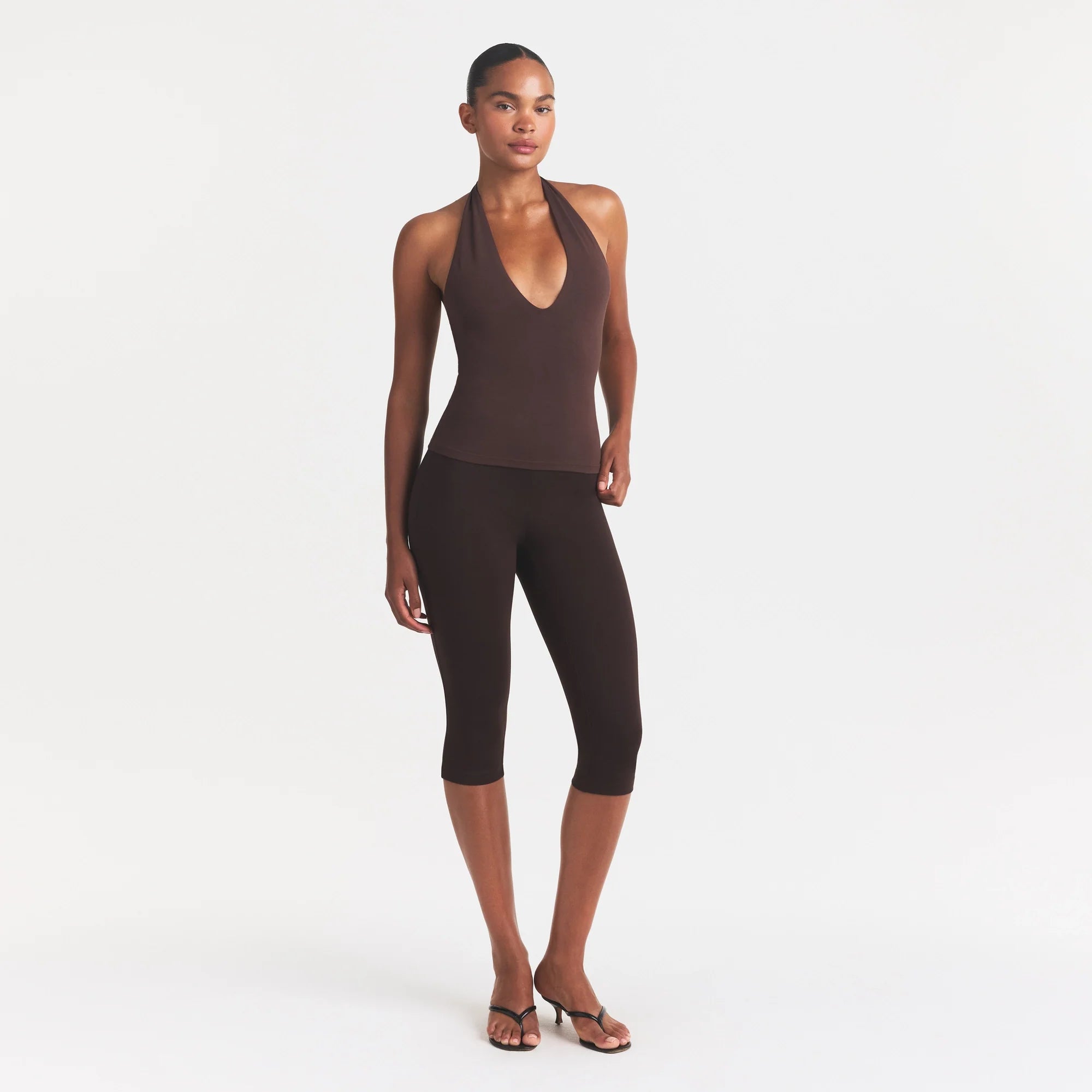 SMOOTH LAYERS HALTER TOP | COCOA ON A MODEL FRONT VIEW @ | FOCUS: 0.0, 1.0, 0.9