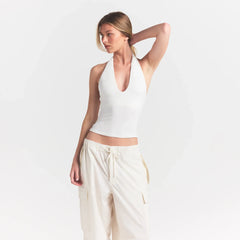 SMOOTH LAYERS HALTER TOP | EGRET ON A MODEL FRONT VIEW @ | FOCUS: 0.0, 1.0, 0.9