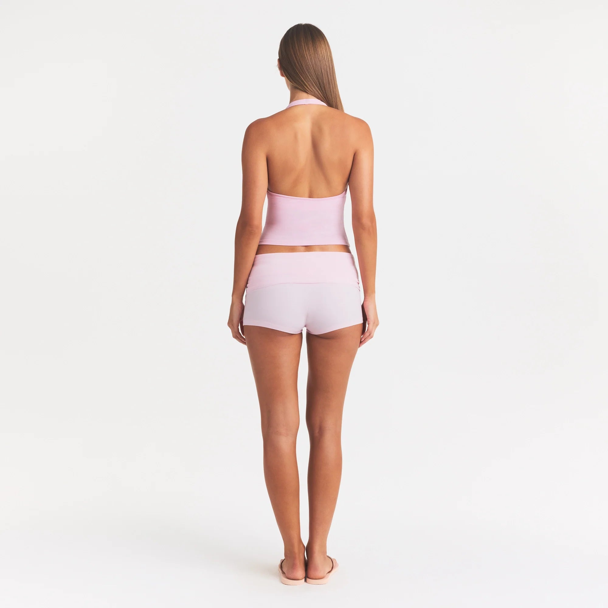 SMOOTH LAYERS HALTER TOP | PEONY ON A MODEL FRONT VIEW @ | FOCUS: 0.0, 1.0, 0.9