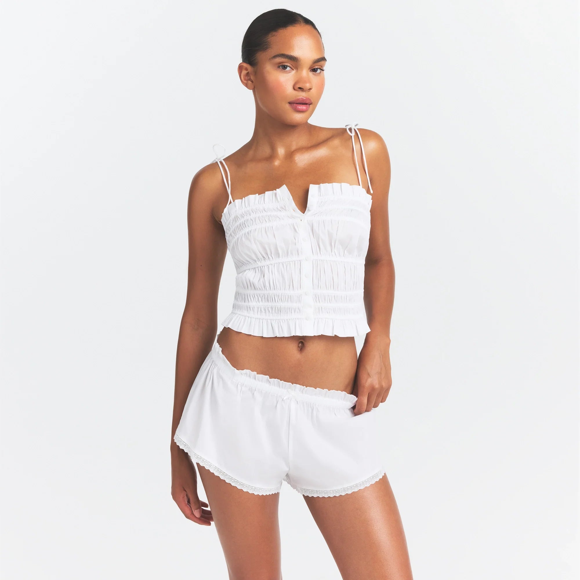 COTTON POPLIN RUFFLE CAMI | SNOW ON A MODEL SIDE VIEW @ | FOCUS: 0.0, 1.0, 0.9