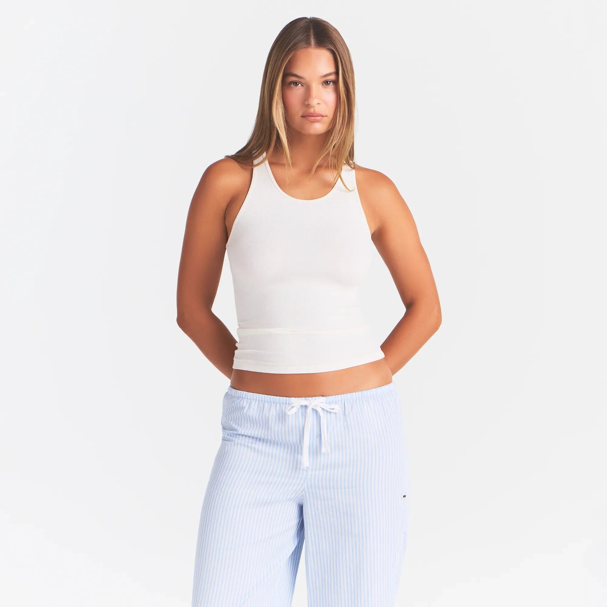 RIB SLEEP TANK | IVORY ON A MODEL | FOCUS: 0.0, 1.0, 0.9