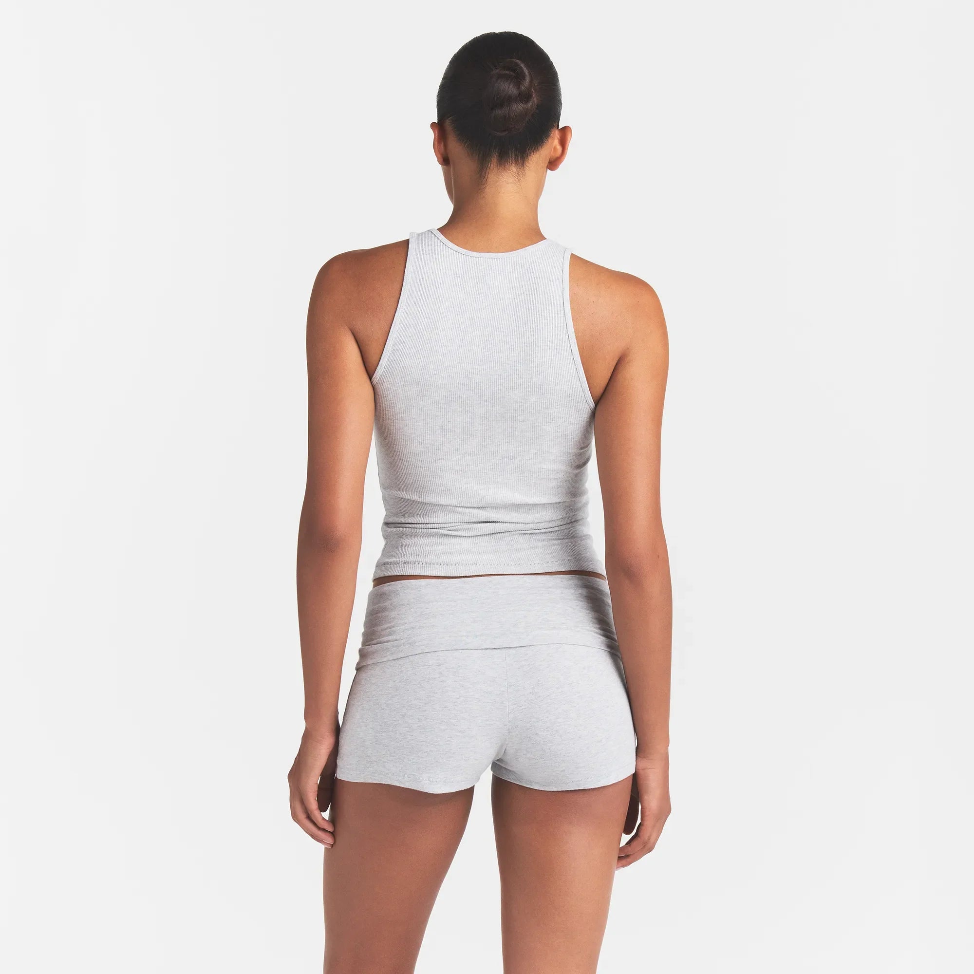 RIB SLEEP TANK | LIGHT HEATHER GREY ON A MODEL | FOCUS: 0.0, 1.0, 0.9