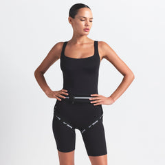 NikeSKIMS MATTE SQUARE NECK TANK | OBSIDIAN ON A MODEL FRONT VIEW @ | FOCUS: 0.9, 0.1, 0.7 @ | FOCUS: 0.0, 1.0, 0.9