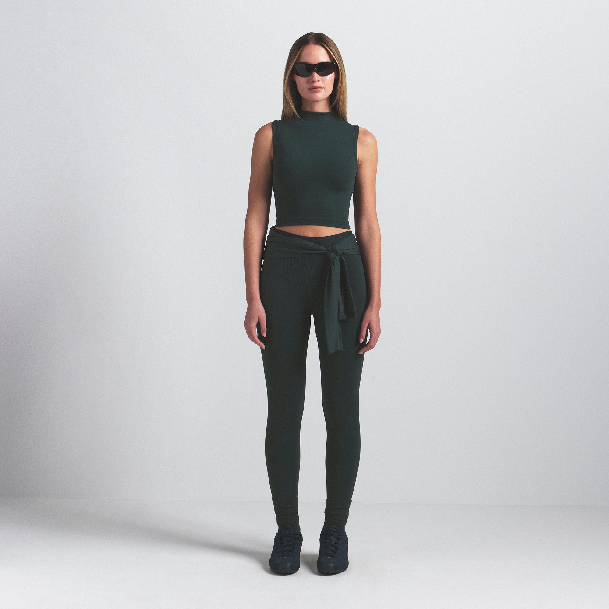 NikeSKIMS VINTAGE SEAMLESS MOCK NECK BRA TOP | DARK TEAL ON A MODEL FRONT VIEW @ | FOCUS: 0.0, 1.0, 0.9
