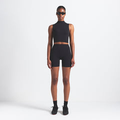 NikeSKIMS VINTAGE SEAMLESS MOCK NECK BRA TOP | OBSIDIAN ON A MODEL FRONT VIEW @ | FOCUS: 0.9, 0.1, 0.7