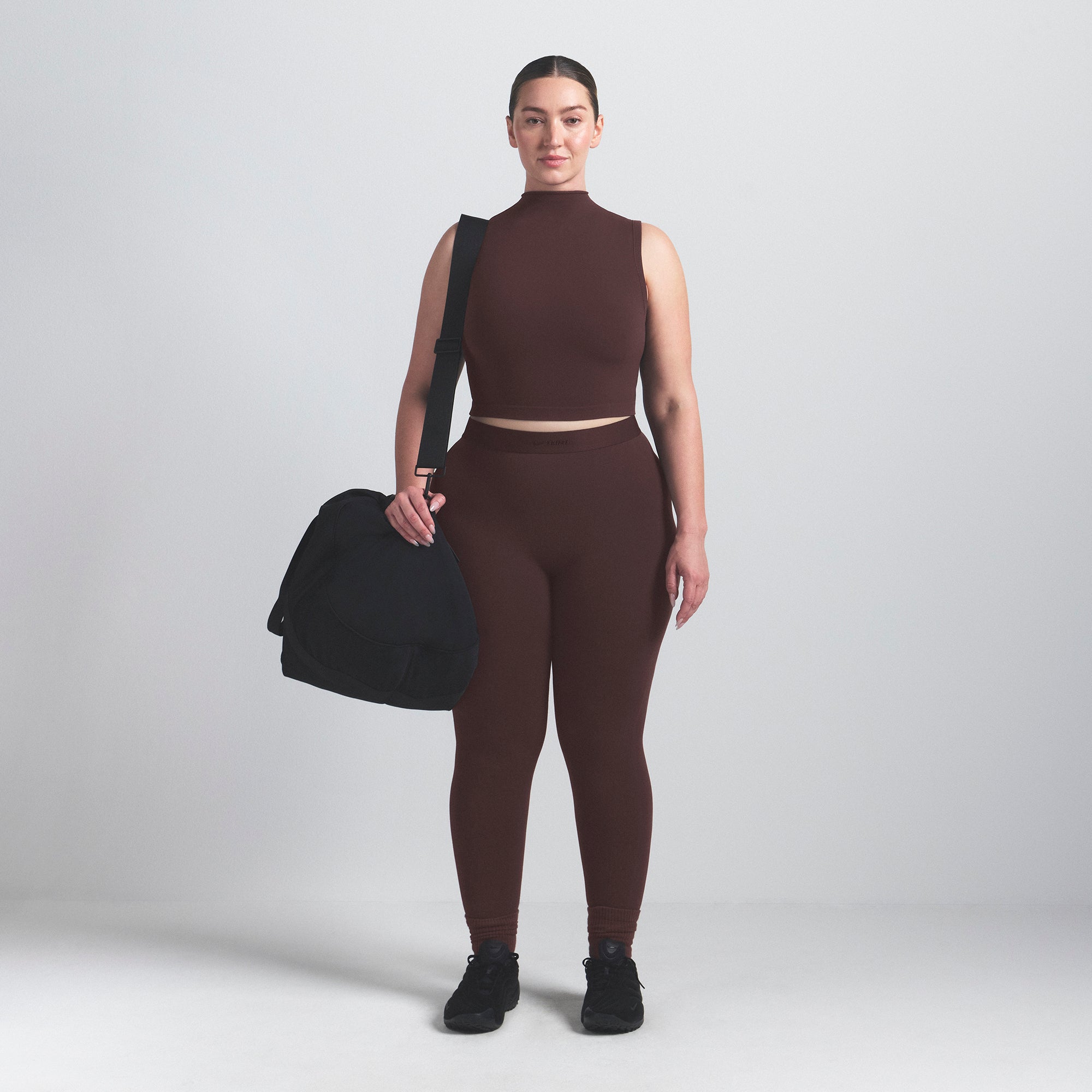 NikeSKIMS VINTAGE SEAMLESS MOCK NECK BRA TOP | PHOENIX ON A MODEL FRONT VIEW