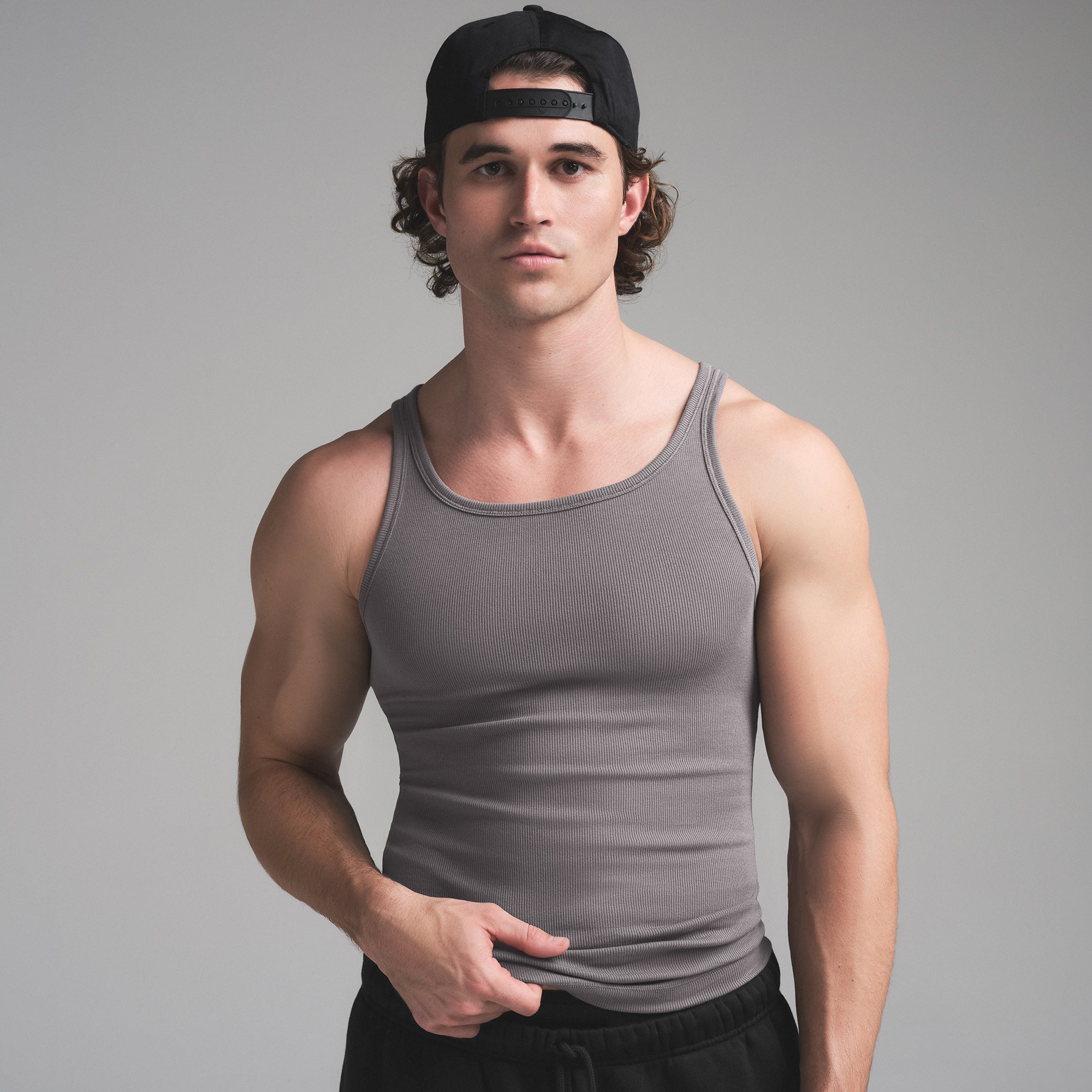 SKIMS COTTON MENS RIB TANK 3-PACK | HEATHER MULTI ON A MODEL SIDE VIEW | FOCUS: 0.0, 1.0, 0.9