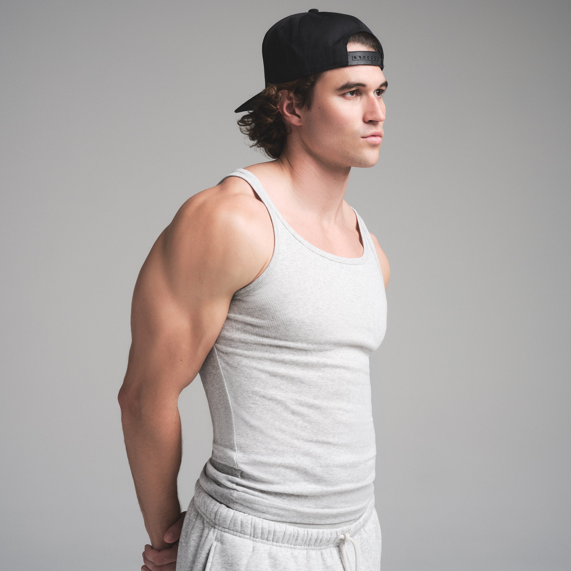 SKIMS COTTON MENS RIB TANK 3-PACK | HEATHER MULTI ON A MODEL SIDE VIEW | FOCUS: 0.0, 1.0, 0.9