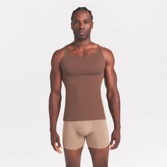 SKIMS COTTON RIB MENS TANK 3-PACK | LINEN ECRU MULTI ON A MODEL SIDE VIEW @ | FOCUS: 0.0, 1.0, 0.9