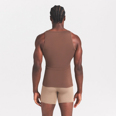 SKIMS COTTON RIB MENS TANK 3-PACK | LINEN ECRU MULTI ON A MODEL SIDE VIEW @ | FOCUS: 0.0, 1.0, 0.9