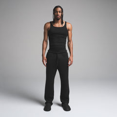 SKIMS COTTON MENS RIB TANK 3-PACK | ONYX ON A MODEL FRONT VIEW | FOCUS: 0.0, 1.0, 0.9