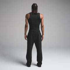 SKIMS COTTON MENS RIB TANK 3-PACK | ONYX ON A MODEL SIDE VIEW | FOCUS: 0.0, 1.0, 0.9