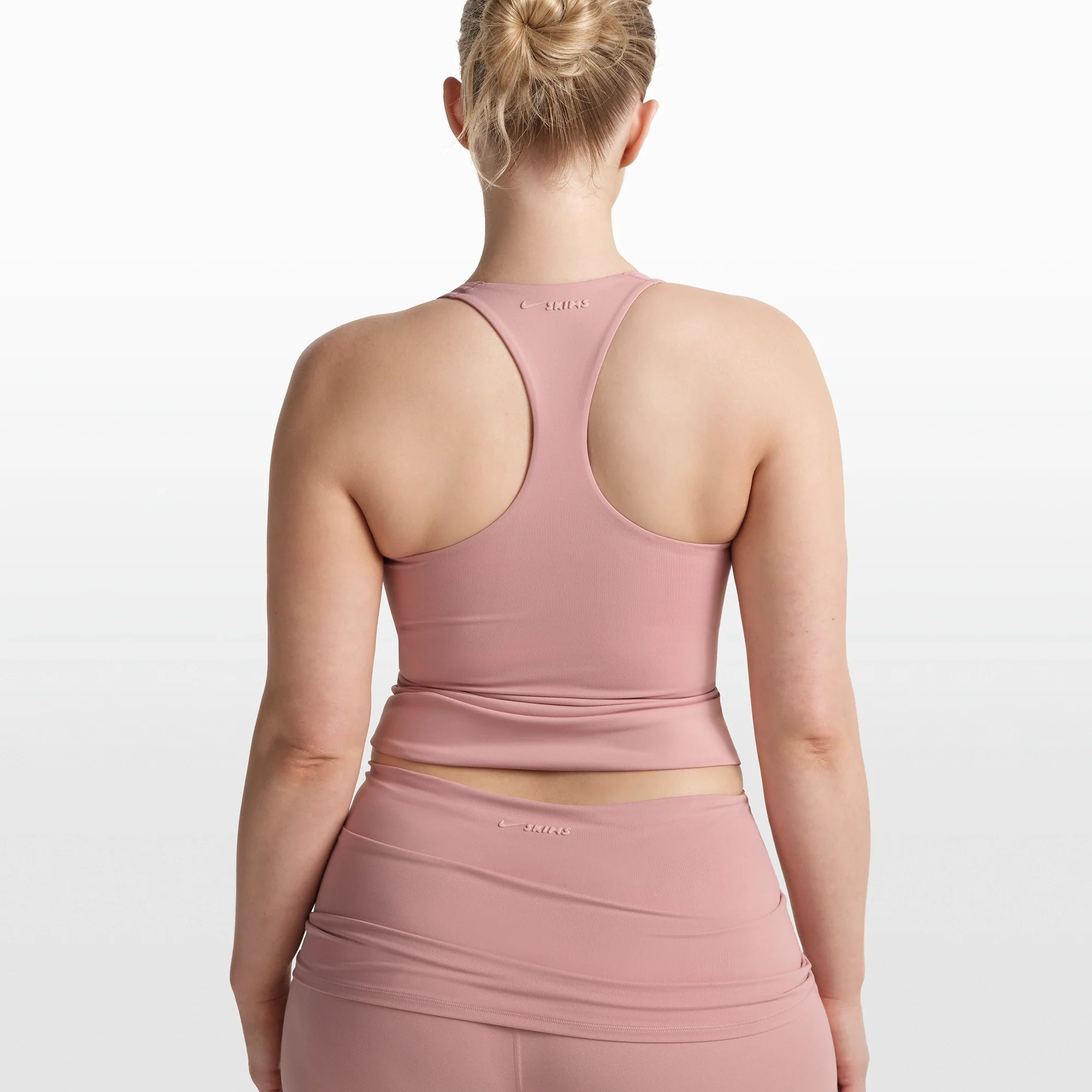 NikeSKIMS MATTE RACER BACK TANK | HIMALAYAN ON A MODEL FRONT VIEW @ | FOCUS: 0.0, 1.0, 0.9