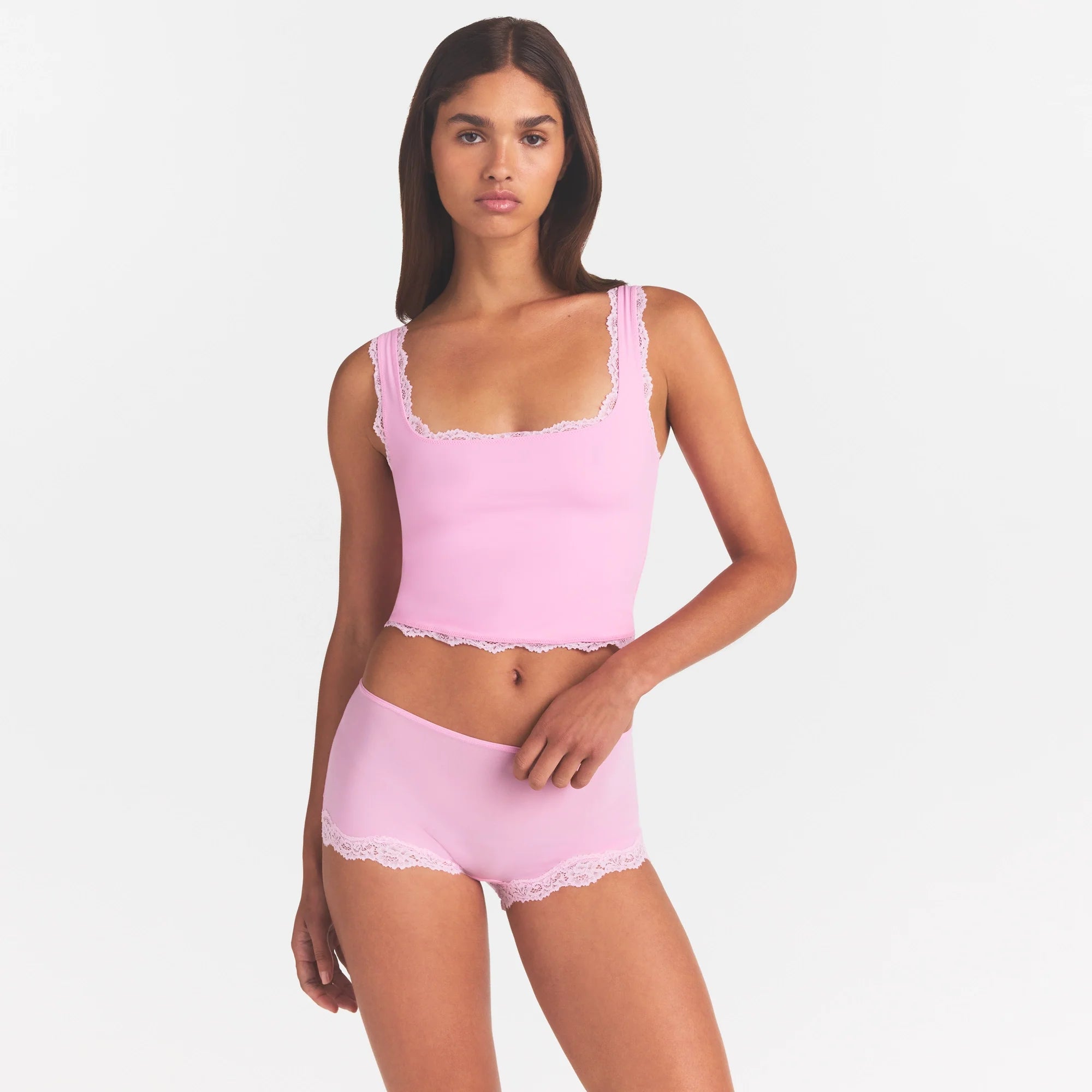 FITS EVERYBODY LACE TANK | BUBBLE GUM TONAL ON A MODEL SIDE VIEW @ | FOCUS: 0.0, 1.0, 0.9