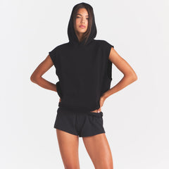 COTTON FLEECE OVERSIZED SLEEVELESS HOODIE | ONYX ON A MODEL SIDE VIEW
