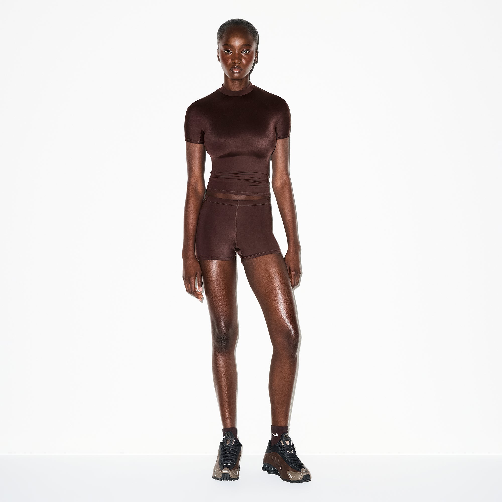 NikeSKIMS SHINE SHORT SLEEVE MOCK NECK TOP | PHOENIX ON A MODEL SIDE VIEW @ | FOCUS: 0.0, 1.0, 0.9