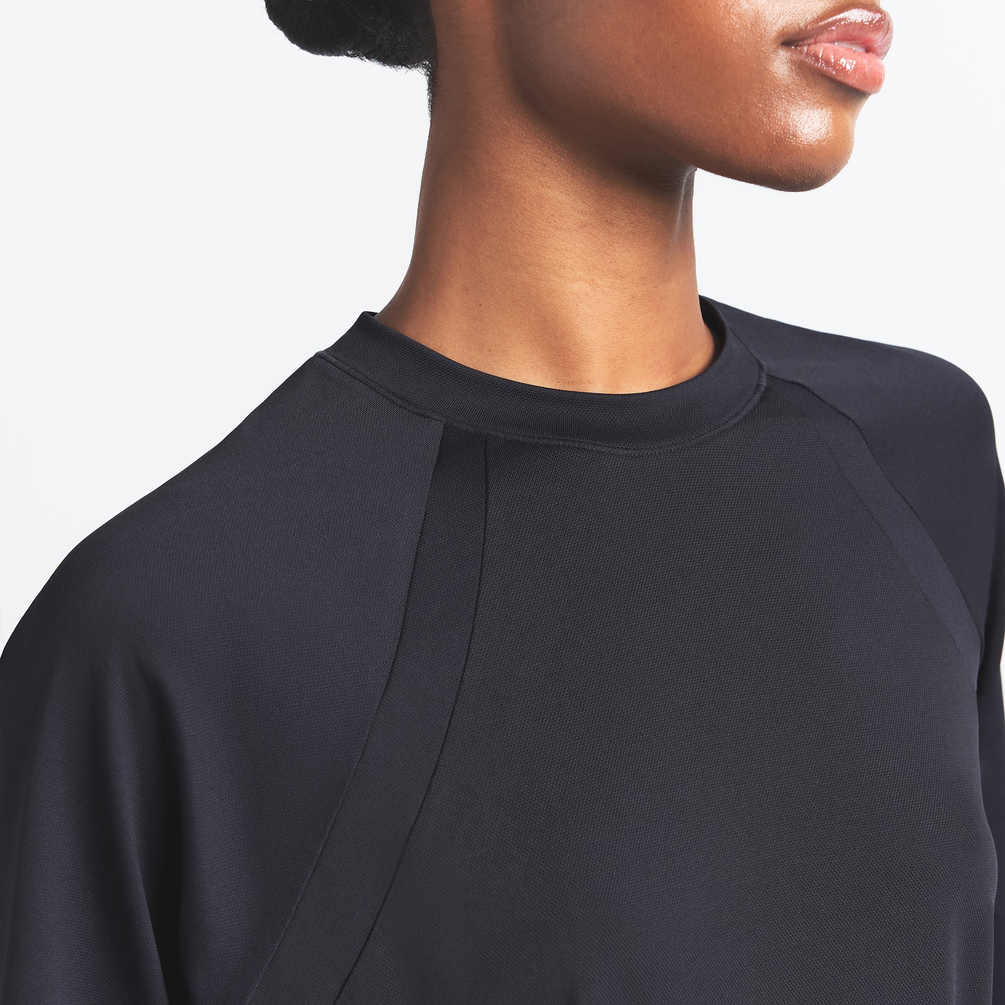 NikeSKIMS AIRY OVERSIZED TEE | OBSIDIAN ON A MODEL SIDE VIEW @ | FOCUS: 0.0, 1.0, 0.9