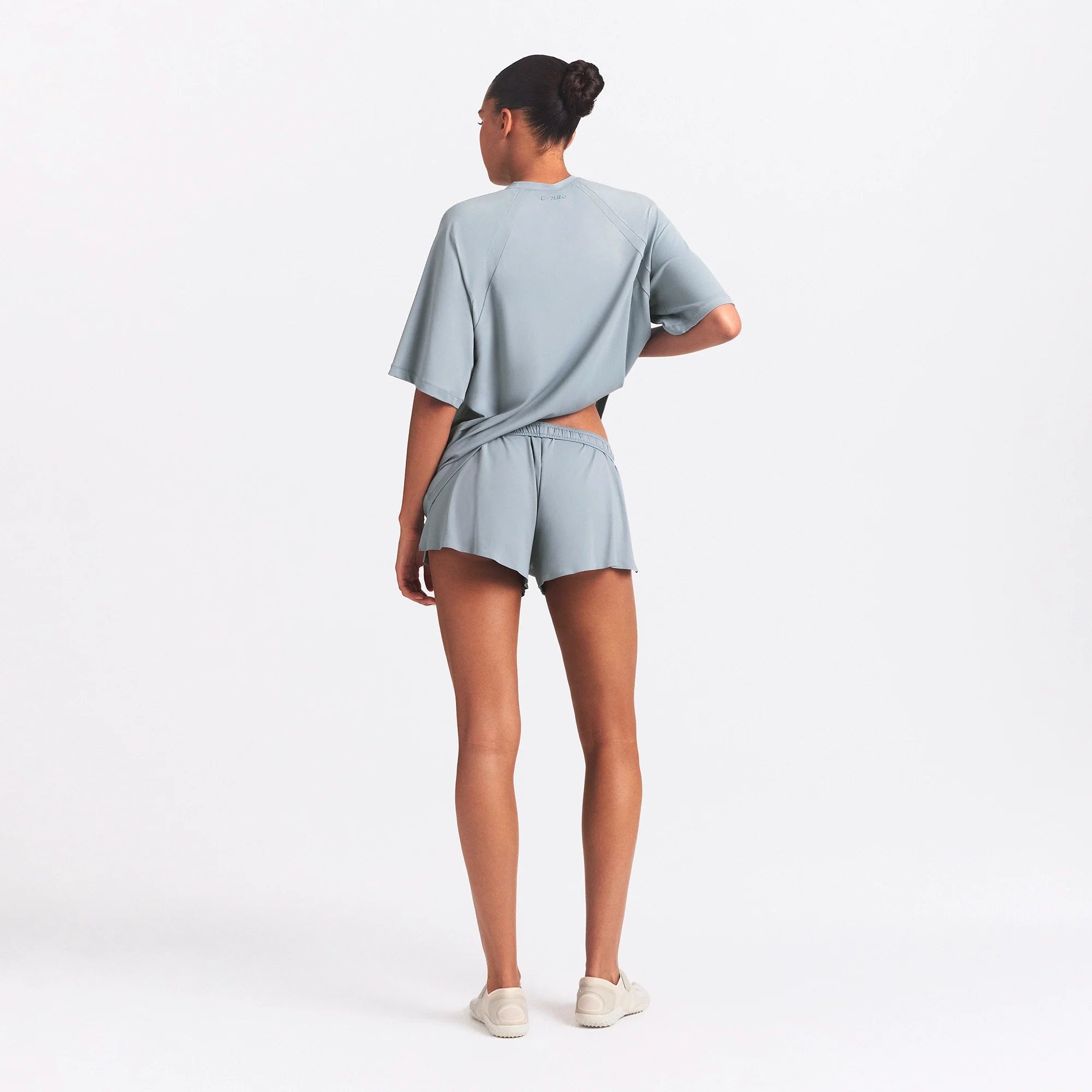 NikeSKIMS AIRY OVERSIZED TEE | WASHED PACIFIC ON A MODEL SIDE VIEW @ | FOCUS: 0.0, 1.0, 0.9