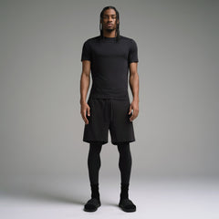 SKIMS SPORT MENS T-SHIRT | OBSIDIAN ON A MODEL FRONT VIEW | FOCUS: 0.0, 1.0, 0.9