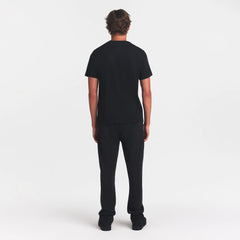 SKIMS COTTON MENS CLASSIC T-SHIRT | ONYX ON A MODEL BACK VIEW @ | FOCUS: 0.0, 1.0, 0.9