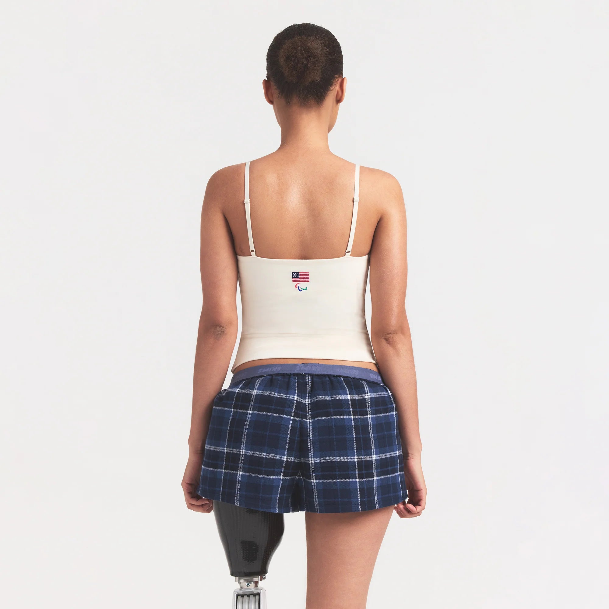 SKIMS FOR TEAM USA COTTON JERSEY PARALYMPIC CAMI | ECRU ON A MODEL SIDE VIEW @ | FOCUS: 0.0, 1.0, 0.9